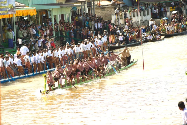 Peoples paddle by legs racing in Phaung Daw Oo Pagoda festival,M