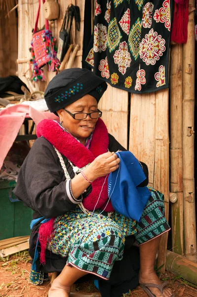 Mein hill tribe embroidery of traditional clothes in Thailand. — Stock Photo, Image