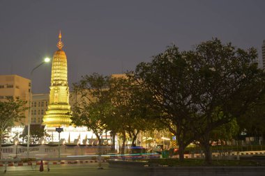 Scenic twilight view of the main ancient pagoda or chedi over two hundred years at Wat Ratchaburana Ratchaworawihan temple in Bangkok capital city,Thailand.