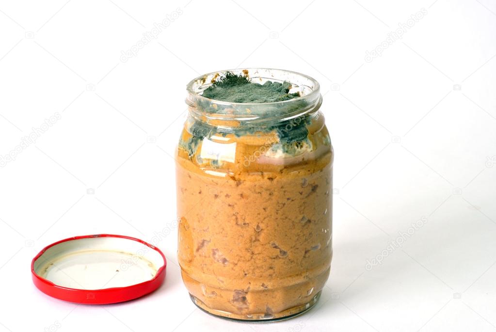green mold on a jar of jam 