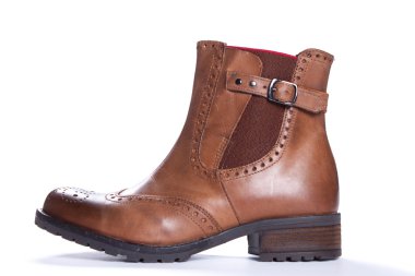 Örnek metin içeren izole kadın kahverengi süet moda çizmeler. Atış