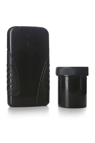 Beyaz izole siyah plastik şişe losyon 