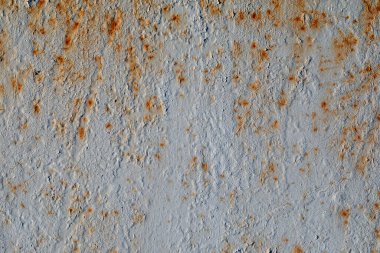 Sert ve ağır pas izleriyle boyanmış eski grunge desenli metal bir yüzey. Üst Manzara. Düz yatıyordu