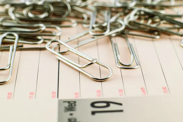 Paper clip and paper — Stock Photo, Image