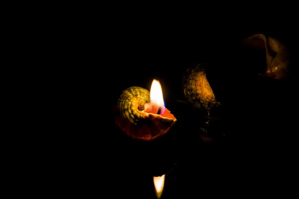 Candle on dark background — Stock Photo, Image