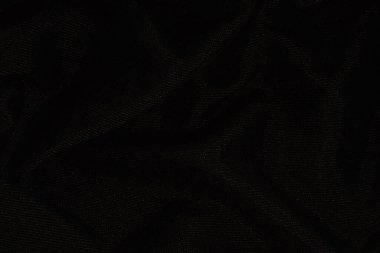 Katlı siyah kumaş dokusu arkaplanı ve kopyalama alanı. Yüksek kalite fotoğraf