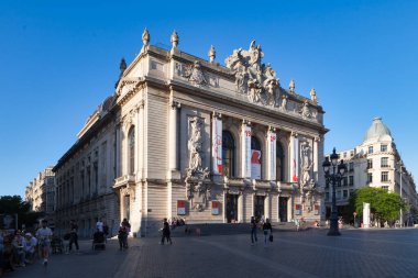 Lille, France - June 22 2020: The Opera de Lille is a neo-classical opera house, built from 1907 to 1913 on the place du Theatre next to Chamber of Commerce. clipart