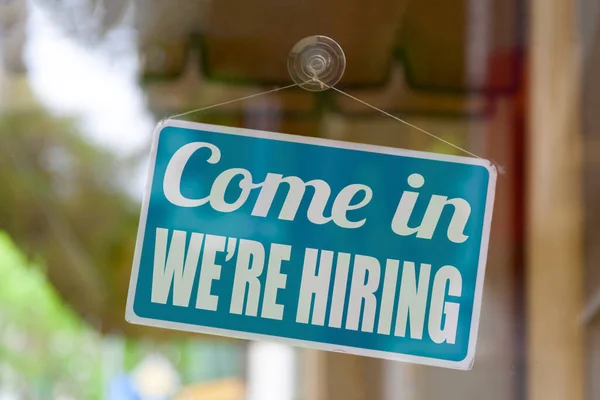 Close Blue Sign Window Shop Displaying Message Come Hiring — Stock Photo, Image