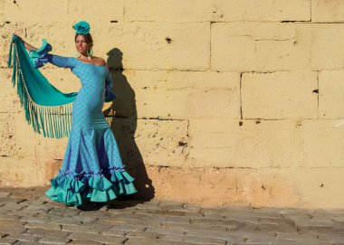 beautiful flamenco  dancer in blue dress