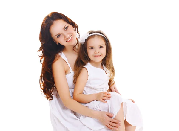 Happy smiling mother and little child daughter on white backgrou — Stock Photo, Image