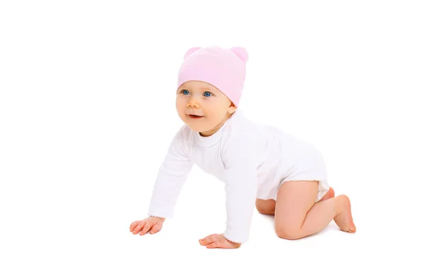 Cute smiling baby in hat crawls on a white background — Stock Photo, Image