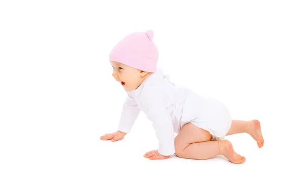 Cute smiling baby in hat crawls on white background — Stock Photo, Image