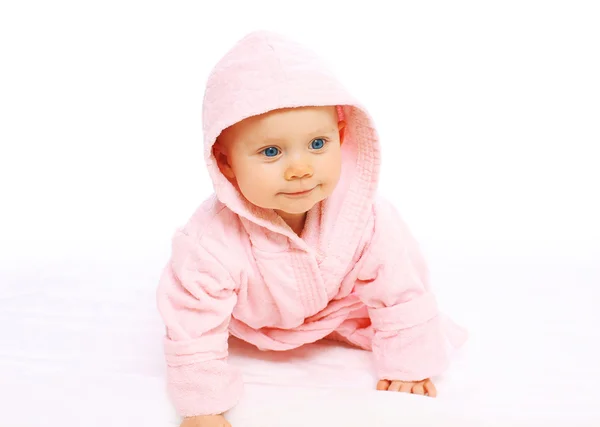 Portrait of cute little baby crawls in the pink bathrobe — Stock Photo, Image