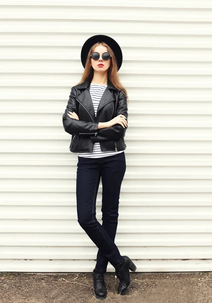 Fashion young woman in black rock style over white background — Stock Photo, Image