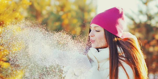 Portrait Beautiful Young Woman Blowing Snowflakes Winter Snowy Background — Stock Photo, Image
