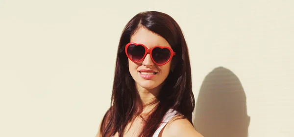 Close Portrait Young Woman Wearing Red Heart Shaped Sunglasses White — Stock Photo, Image