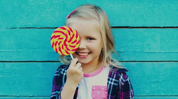 Portrait Happy Smiling Little Girl Child Covering Her Eye Lollipop — Stock Fotó