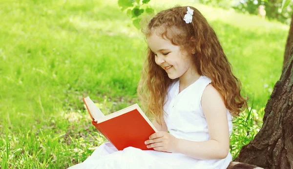 Portrait Little Girl Child Reading Book Grass Summer Park — Stock Photo, Image
