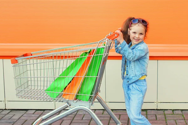 Little Girl Child Trolley Cart Shopping Bags Wearing Denim Clothes — Stock Photo, Image