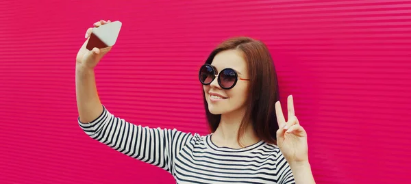 Portrait Stylish Happy Smiling Woman Taking Selfie Picture Smartphone Pink — Zdjęcie stockowe