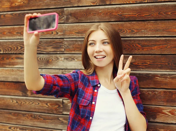 Portrait Happy Smiling Teenager Girl Taking Selfie Picture Smartphone Wooden — Stok fotoğraf