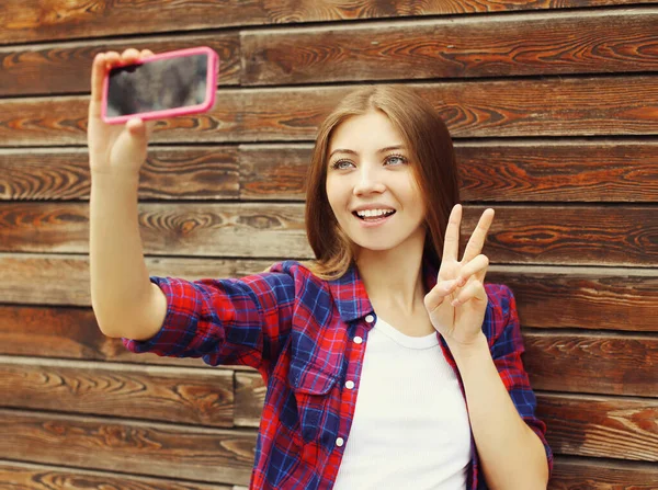 Portrait Happy Smiling Teenager Girl Taking Selfie Picture Smartphone Wooden Royalty Free Stock Images