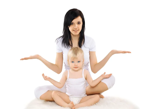 Mom and baby doing exercise, gymnastics, yoga, fitness and healt — Stock Photo, Image