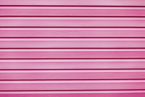 Bakgrunn på rosa plater, sett ovenfra – stockfoto