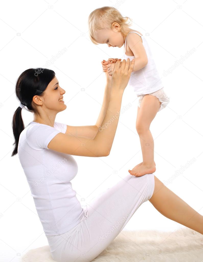 Happy mom and baby doing exercise — Stock Photo © Rohappy 52334991