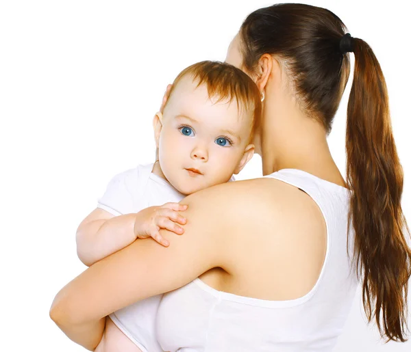 Mother and baby, cute little baby looking on the camera Stock Photo by