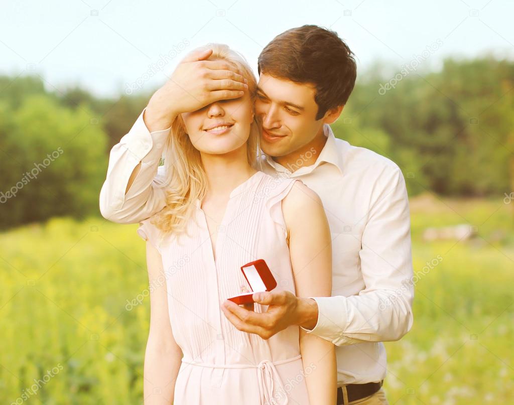 Boyfriend closed his eyes a girl, making a surprise ring, romanc