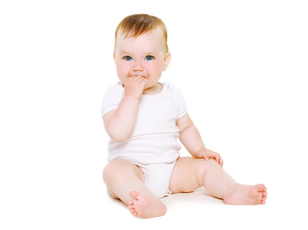 Cute baby sitting on a white background — Stock Photo, Image