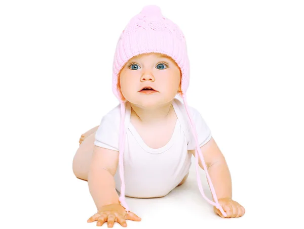 Sweet baby crawls in knitted hat — Stock Photo, Image