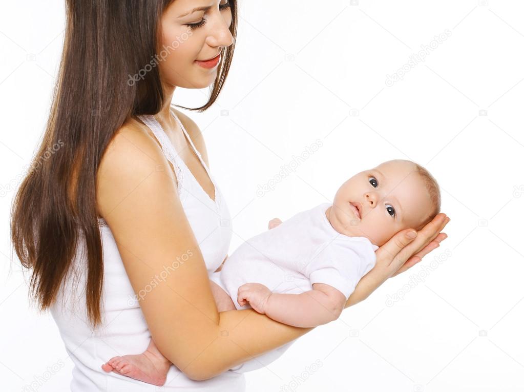 Young mother holding infant on hands