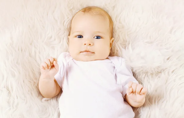 Sweet infant lying on the bed, top view — Stock Photo, Image