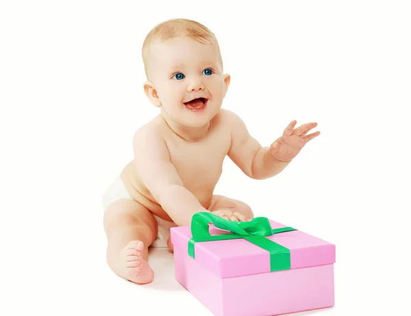 Sweet baby and gift on a white background — Stock Photo, Image