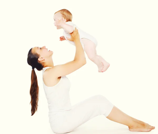 Dítě a matka dělá cvičení — Stock fotografie
