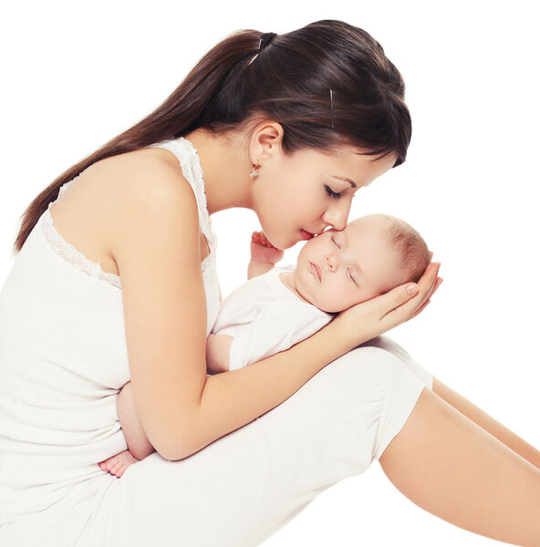 Young lovely mother kissing her baby