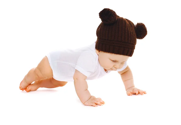 Funny little baby in the knitted brown hat — Stock Photo, Image