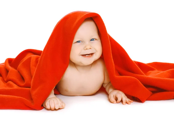 Portrait of funny baby under the red towel — Stock Photo, Image