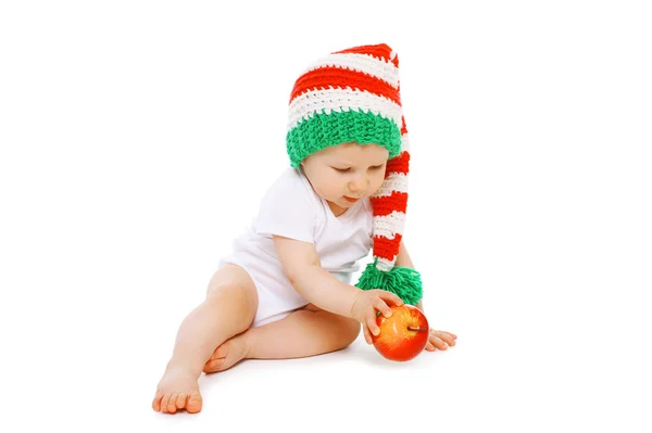 Christmas and childhood concept - little baby in bright knitted — Stock Photo, Image