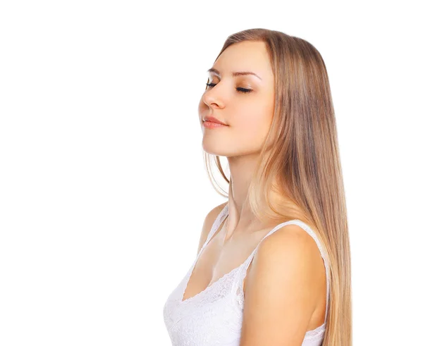 Portrait of beautiful young woman enjoying with closed eyes on a — Stock Photo, Image