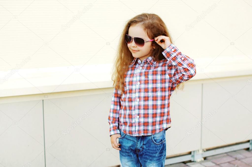 Fashion kid concept - portrait of stylish little girl child wear