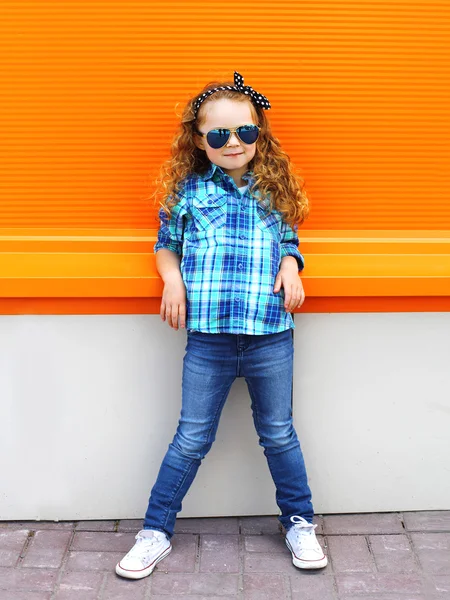 Fashion kid concept - stylish little girl child wearing a shirt — ストック写真