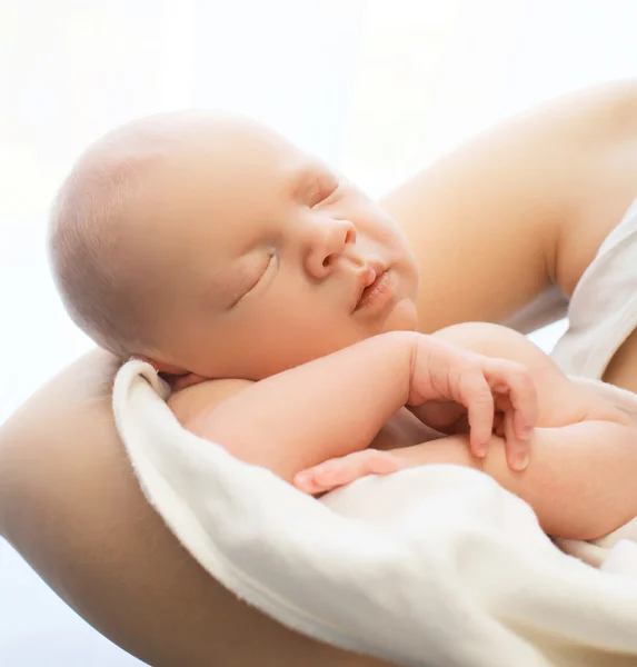 Portrait of sleep baby on hands mother at home — Stock Photo, Image
