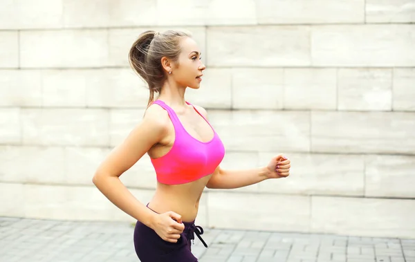 Fitness woman running in city, female runner workout - sport and — Zdjęcie stockowe