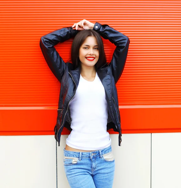 Portrait beautiful smiling young brunette woman wearing a rock b — ストック写真