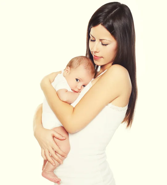 Feliz joven madre sosteniendo en las manos a su bebé — Foto de Stock