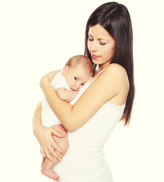 Felice giovane madre che tiene per mano il suo bambino — Foto Stock