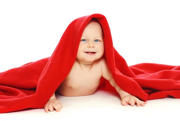 Portrait of happy funny little baby under towel crawl — Stock Photo, Image